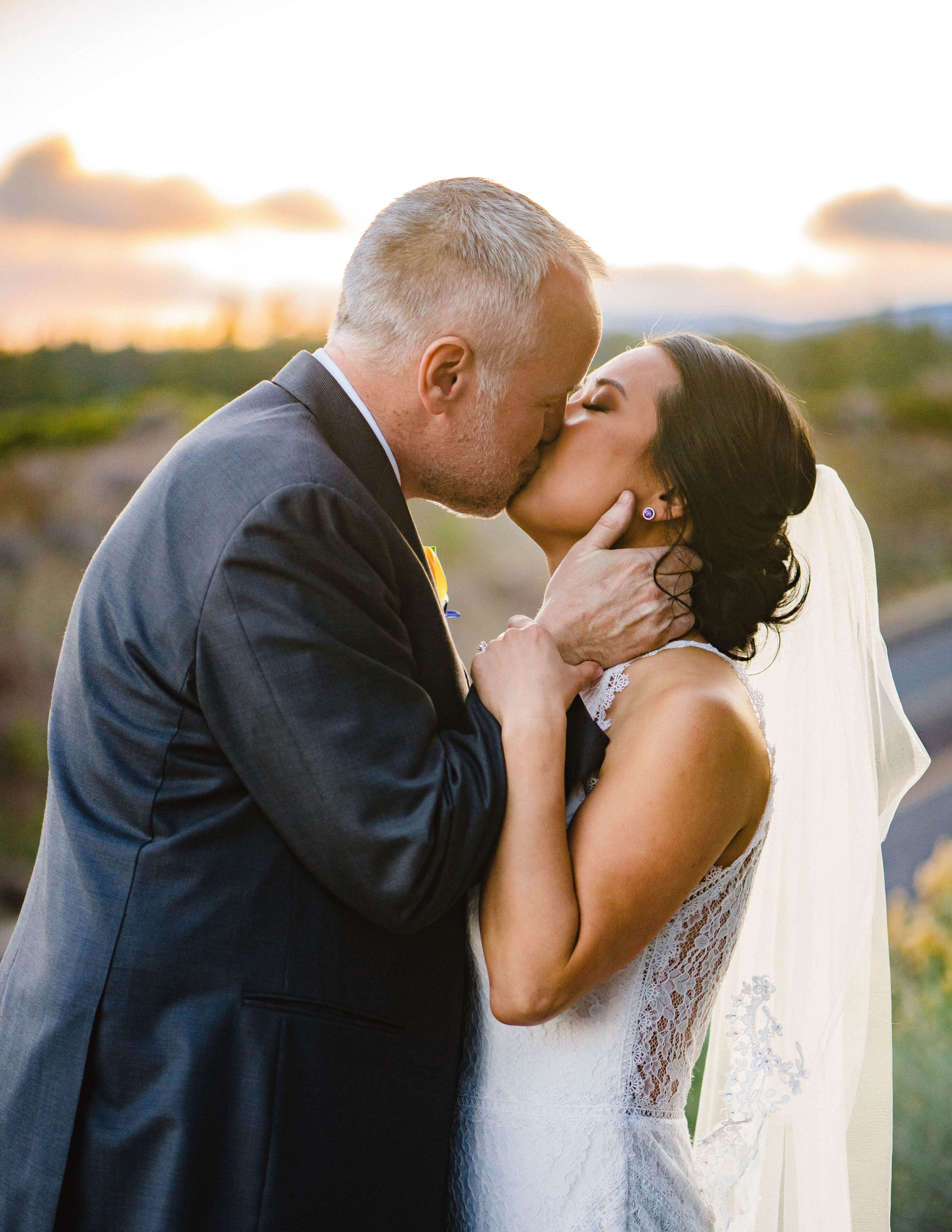 Zotti: Wedding Photographer captures intimate wedding moment at sunset at the Tetherow Resort in Bend, Oregon.